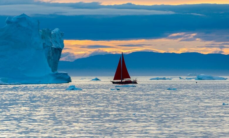 midnight sun iceberg sightseeing ilulissat sailboat