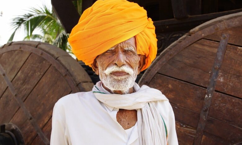 travel skills: old Indian man in yellow turban